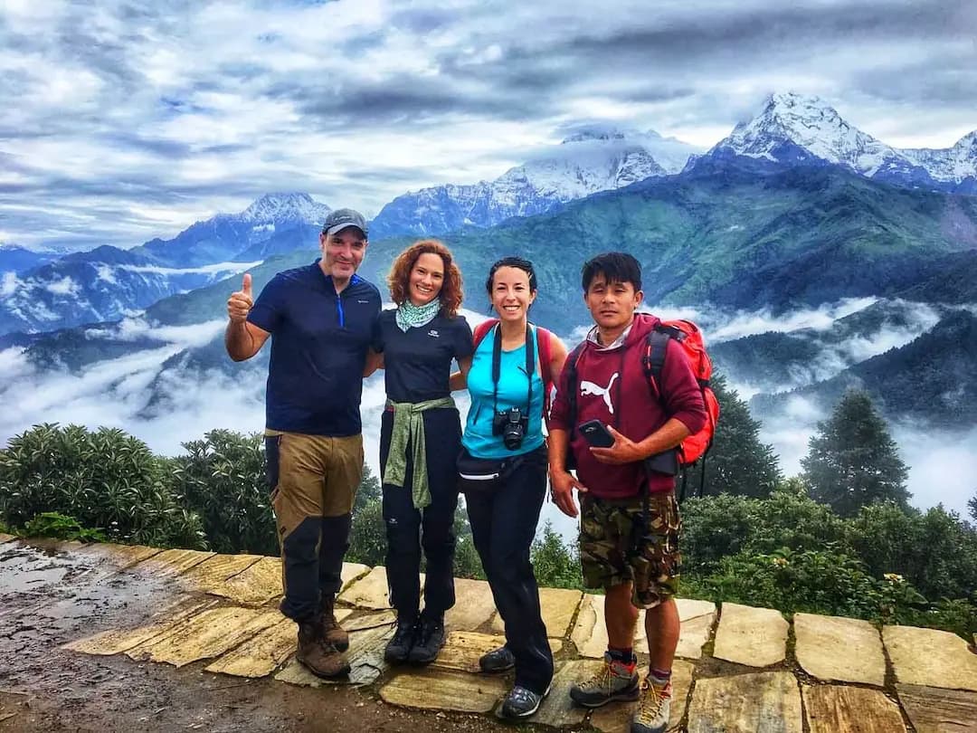 Trekkers walking through rhododendron forest on Ghorepani Poon Hill trail